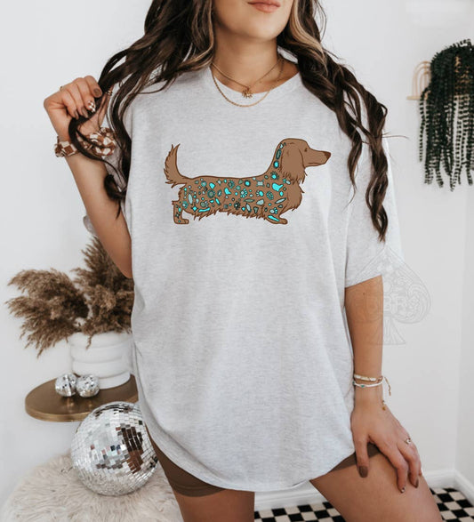 Decked in turquoise, long haired wiener dog Western Graphic