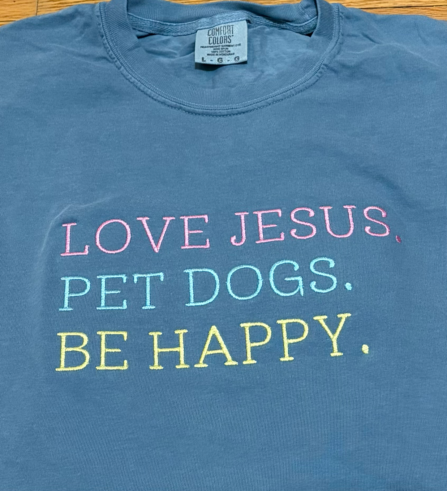 Love Jesus. Pet Dogs. Be Happy. Embroidered Comfort Colors T-Shirt